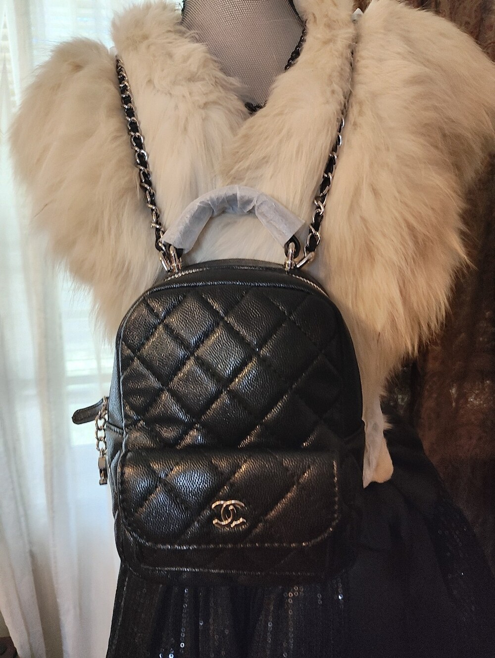 Black Quilted Leather Mini Backpack with Interwoven Chain Straps